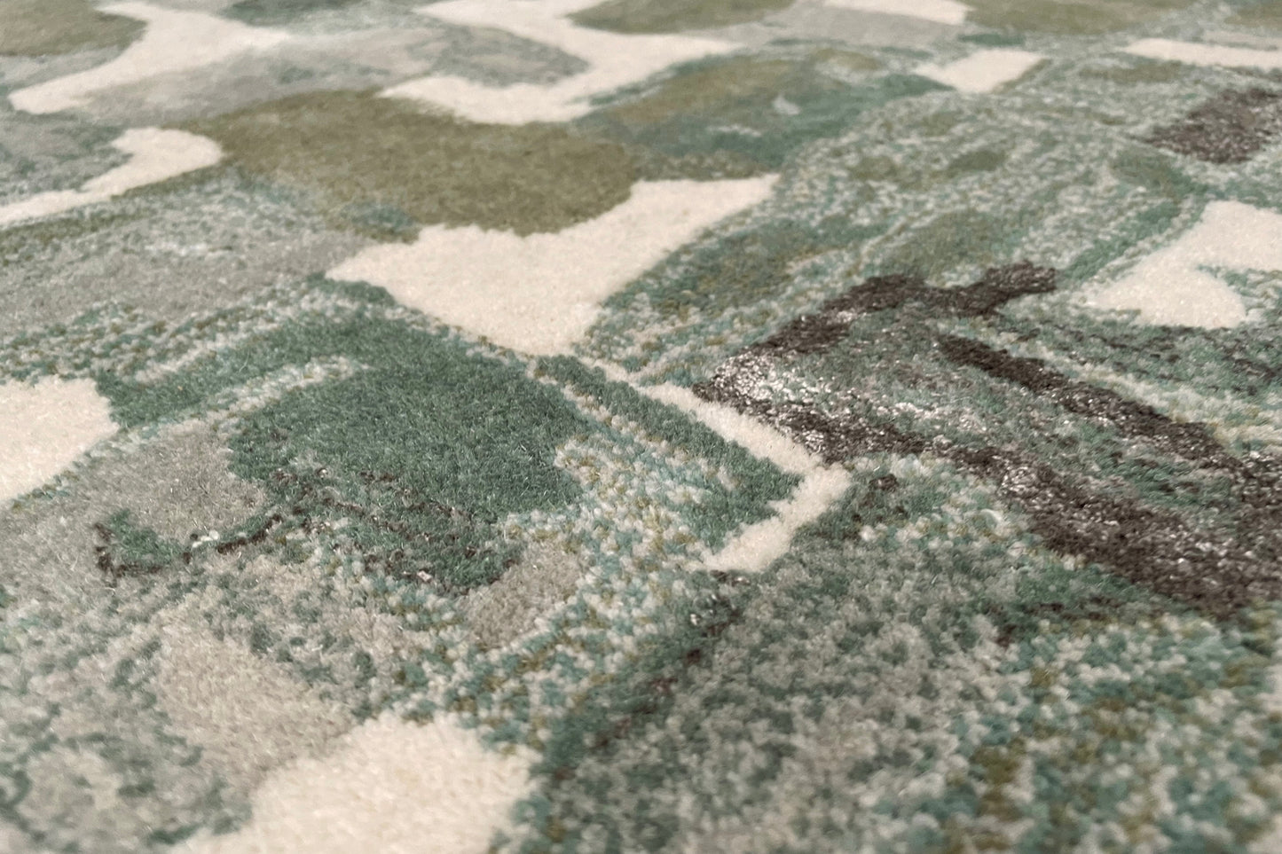 détails tapis tufté main bleu gris vert