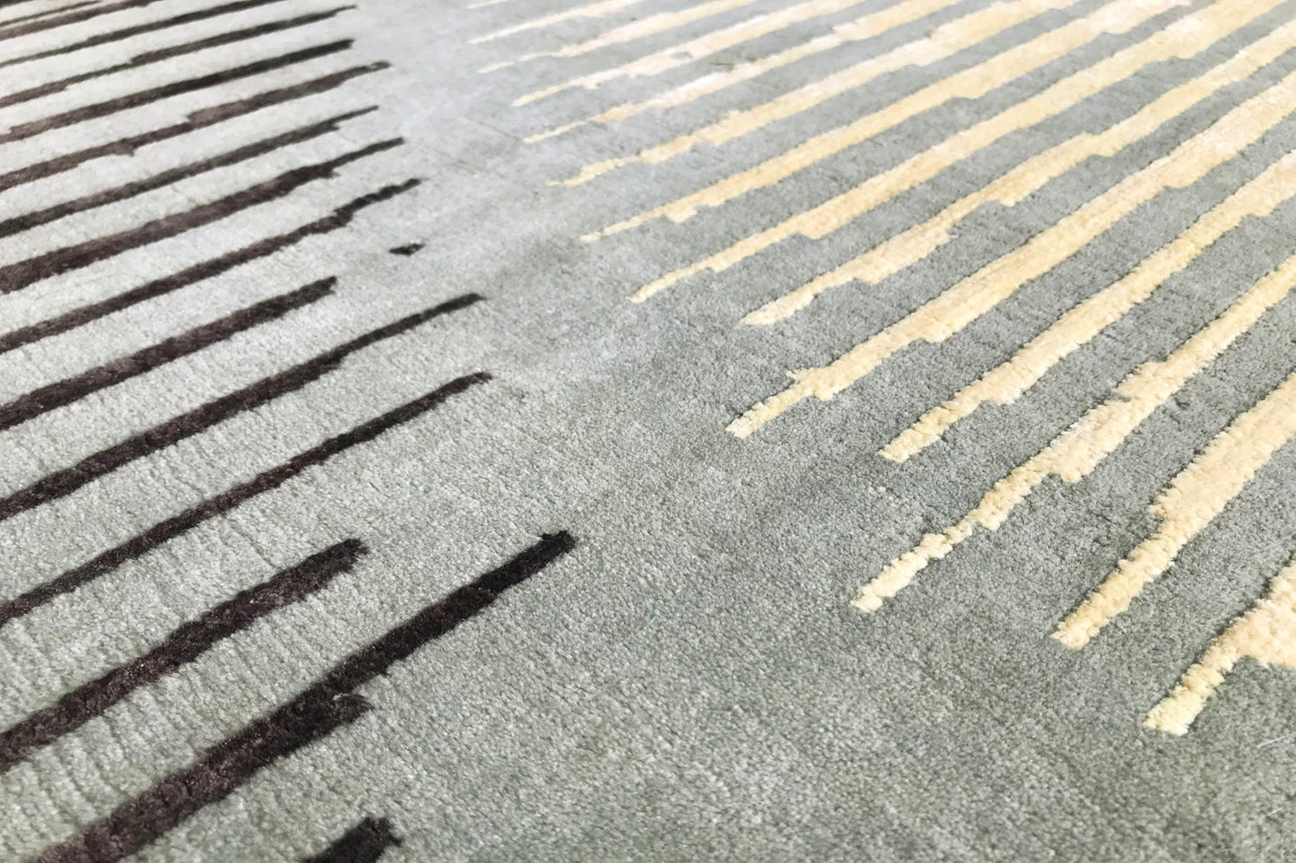 détails tapis noué main bleu jaune marron