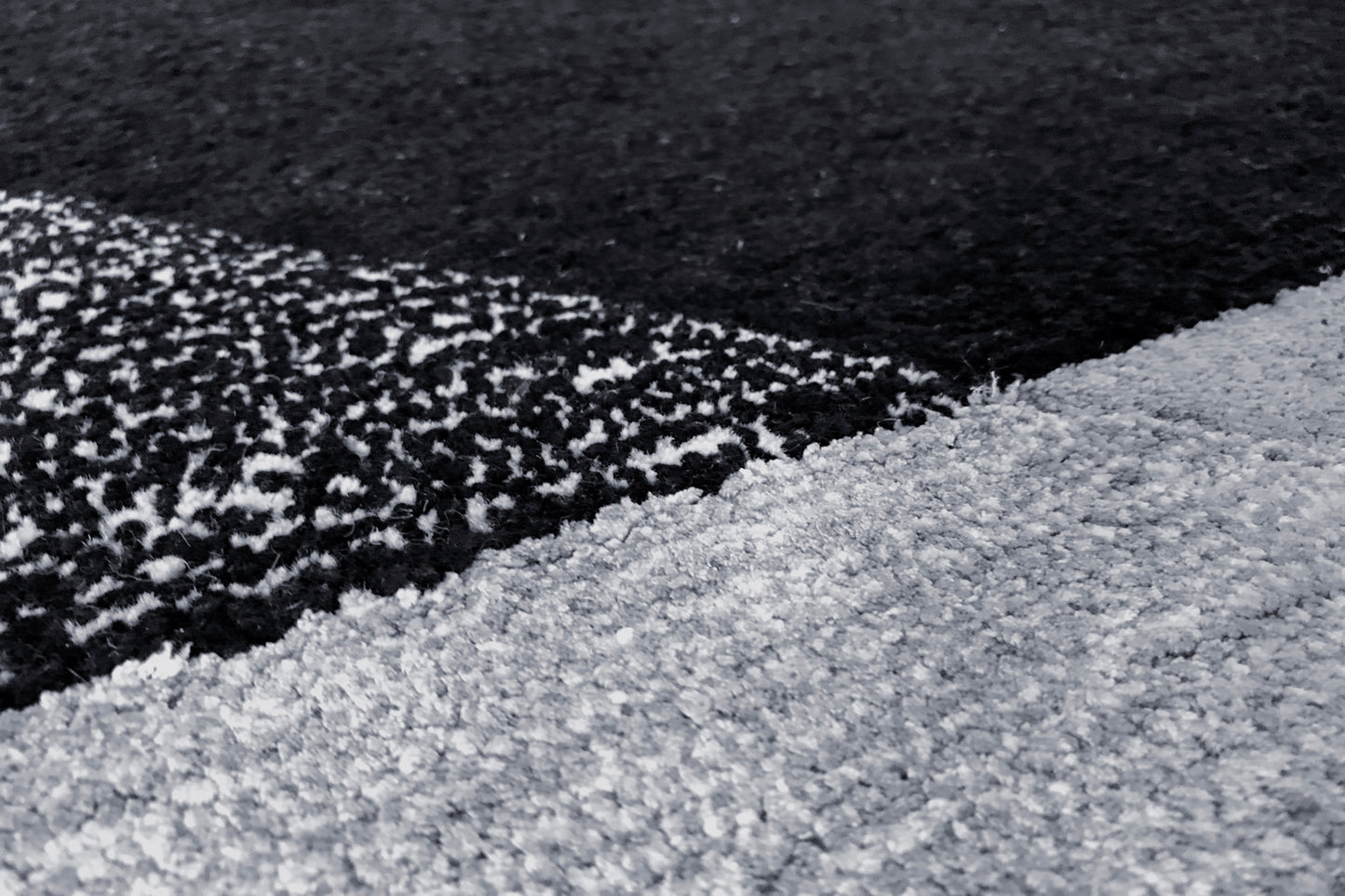 détails tapis tufté main gris noir écru