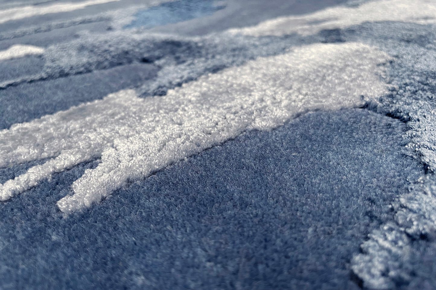 détails tapis noué main bleu gris