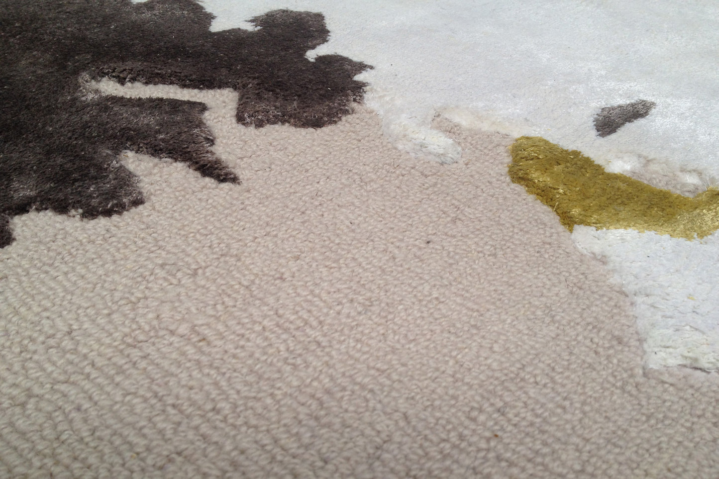 détails tapis tufté main gris vert noir blanc