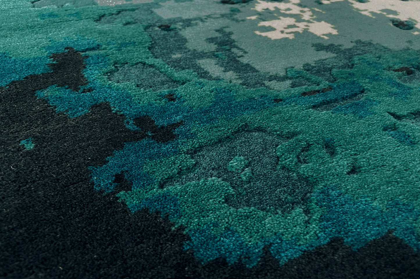 détails tapis noué main bleu