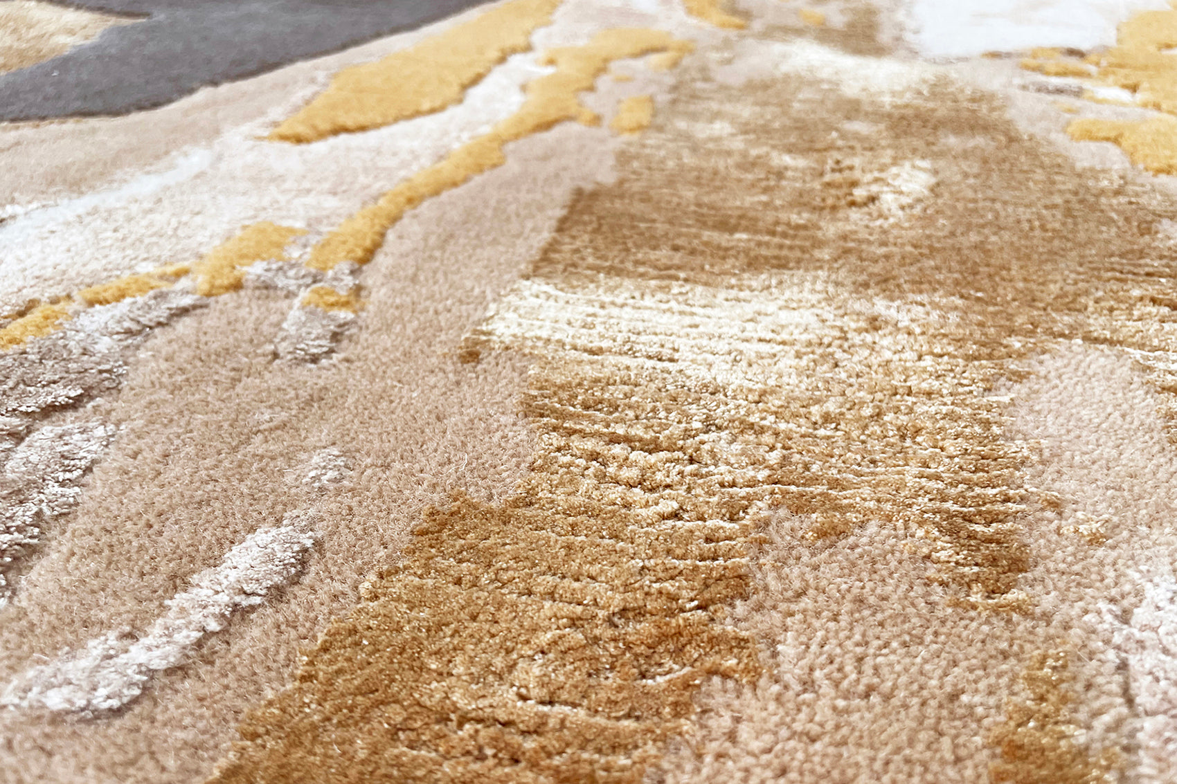 détails tapis noué main beige marron jaune