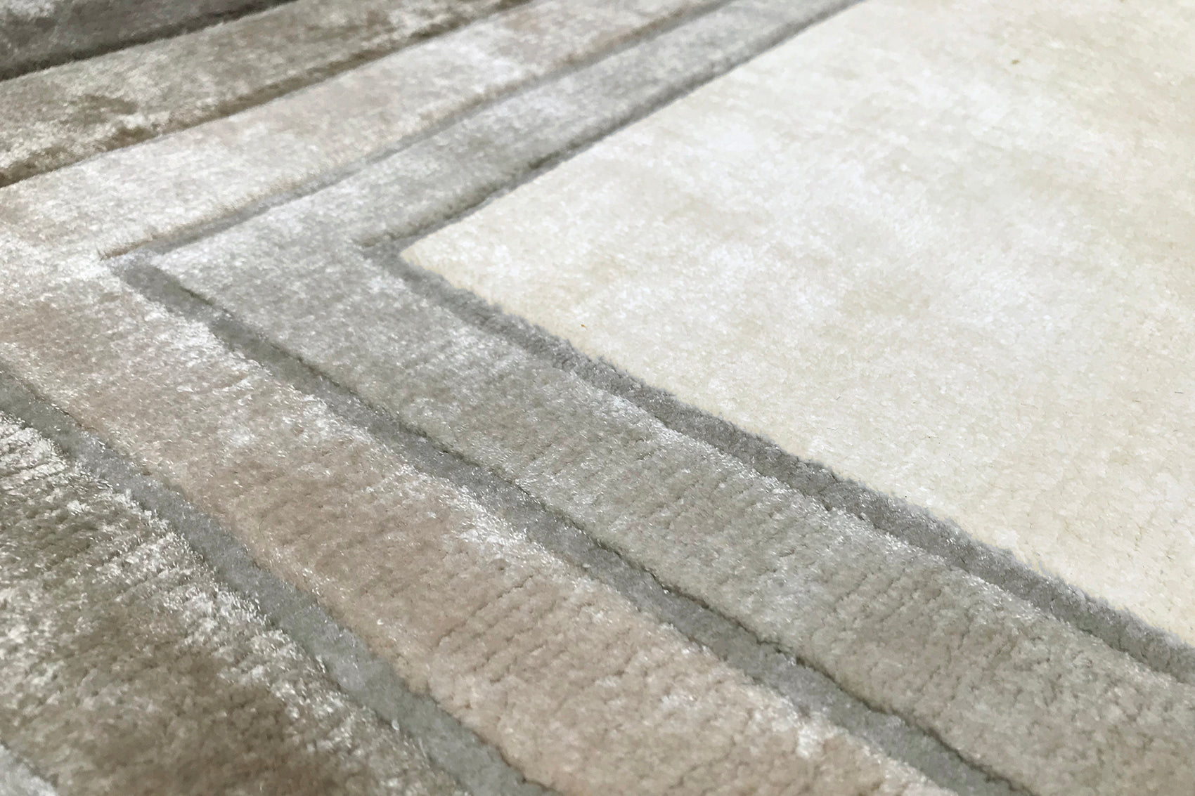 détails tapis noué main gris beige écru