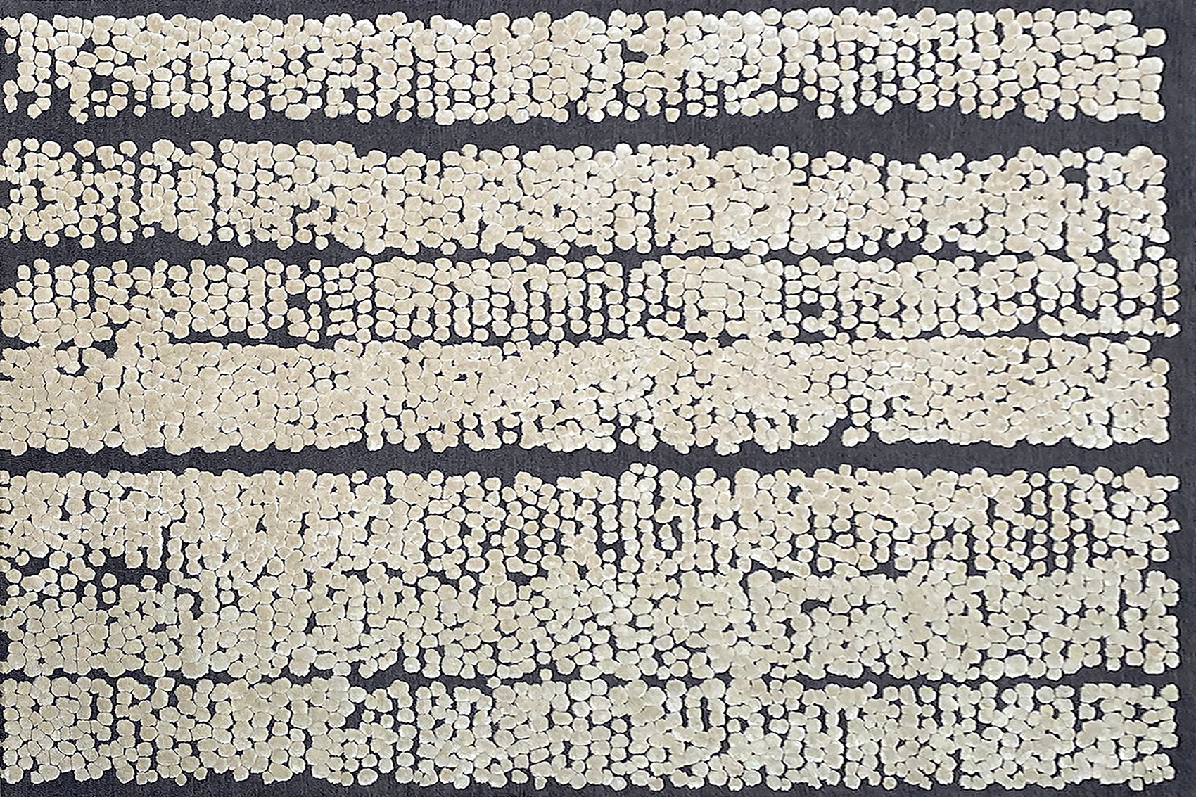 aplat tapis tufté main noir blanc