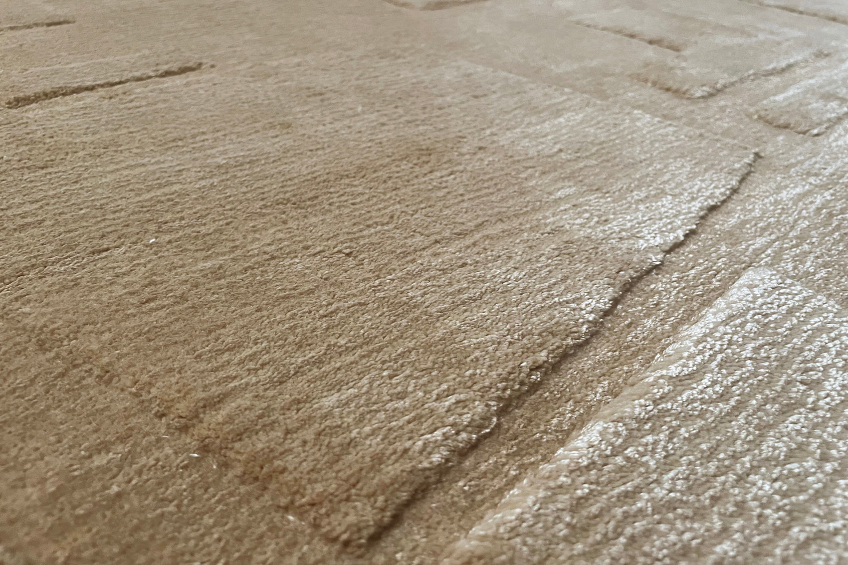 détails tapis tissé main beige