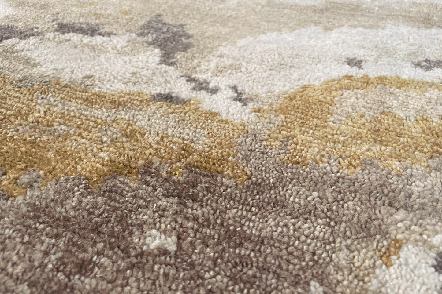détails tapis noué main écru blanc marron jaune