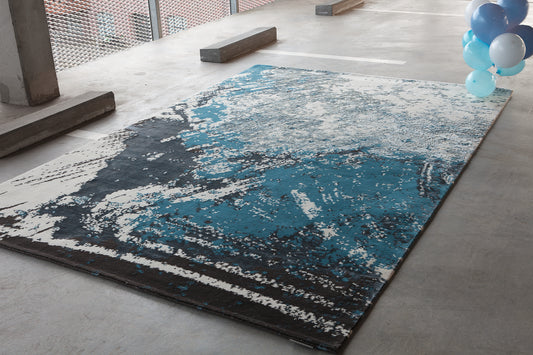 ambiance tapis noué main bleu gris et noir 