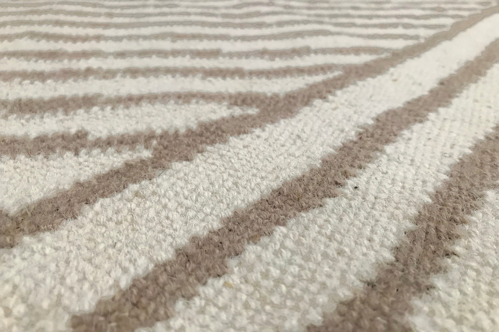 détails tapis tissé main beige écru