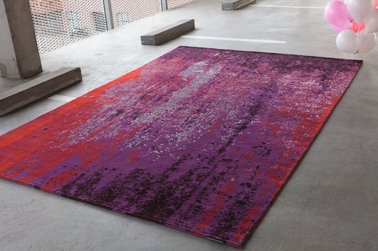 ambiance tapis noué main rouge orange violet