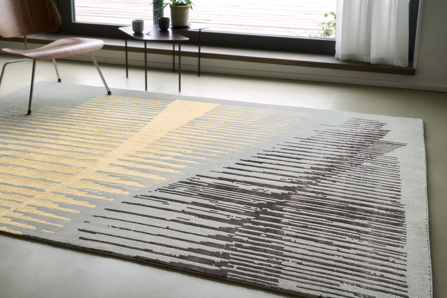 ambiance tapis noué main bleu jaune marron