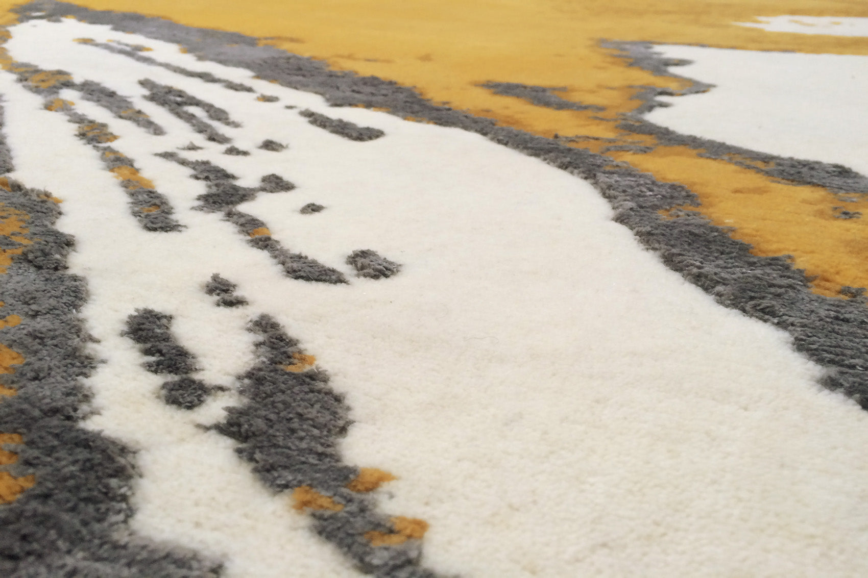 détails tapis noué main gris jaune écru
