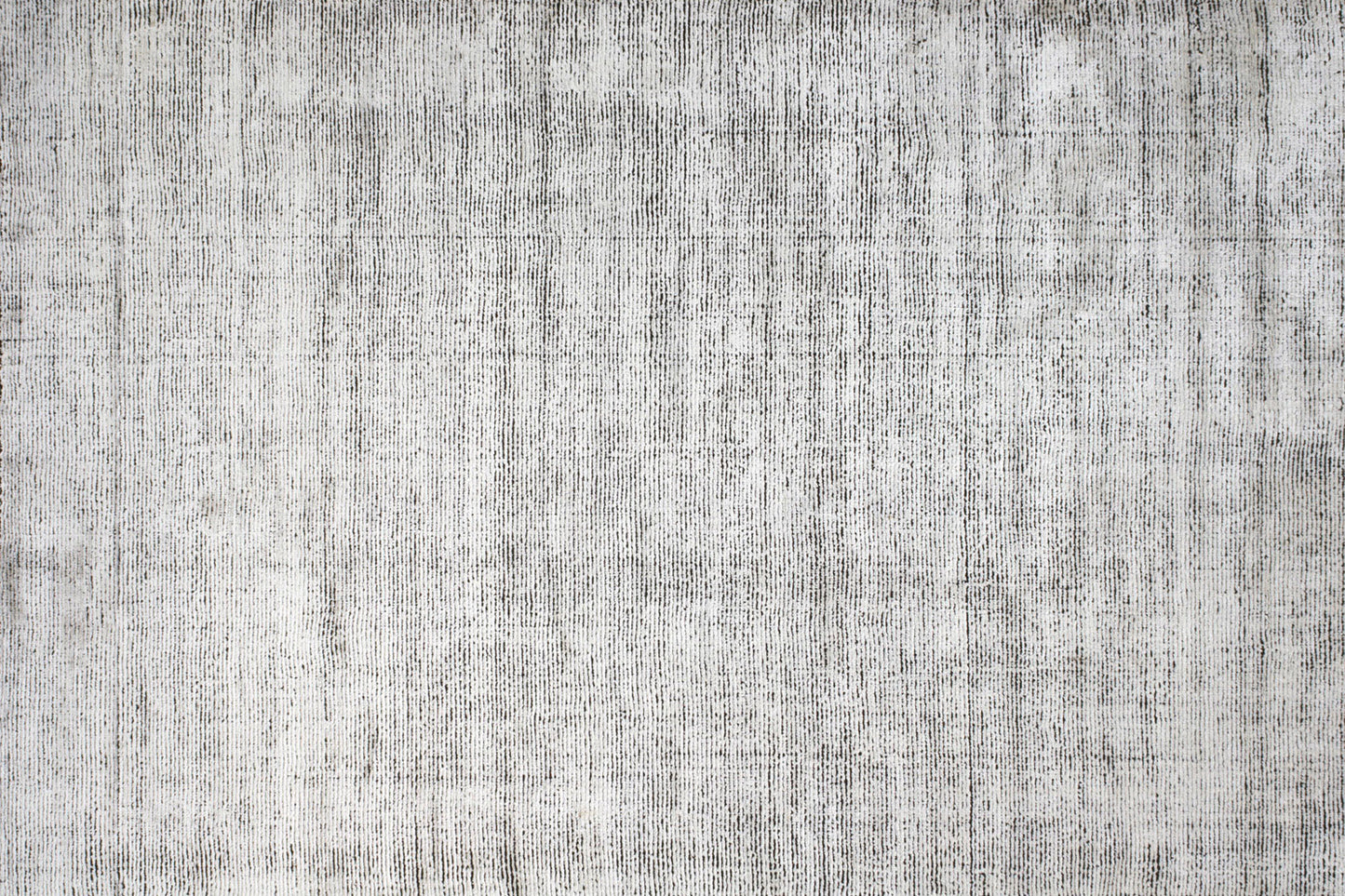 aplat tapis tissé main noir blanc