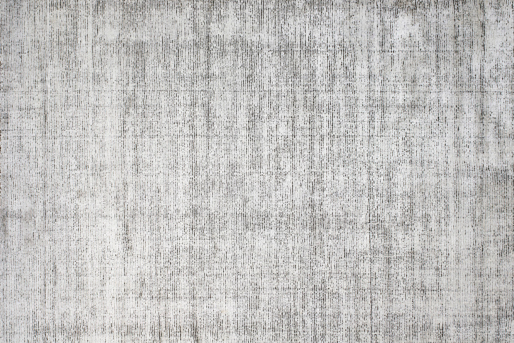 aplat tapis tissé main noir blanc